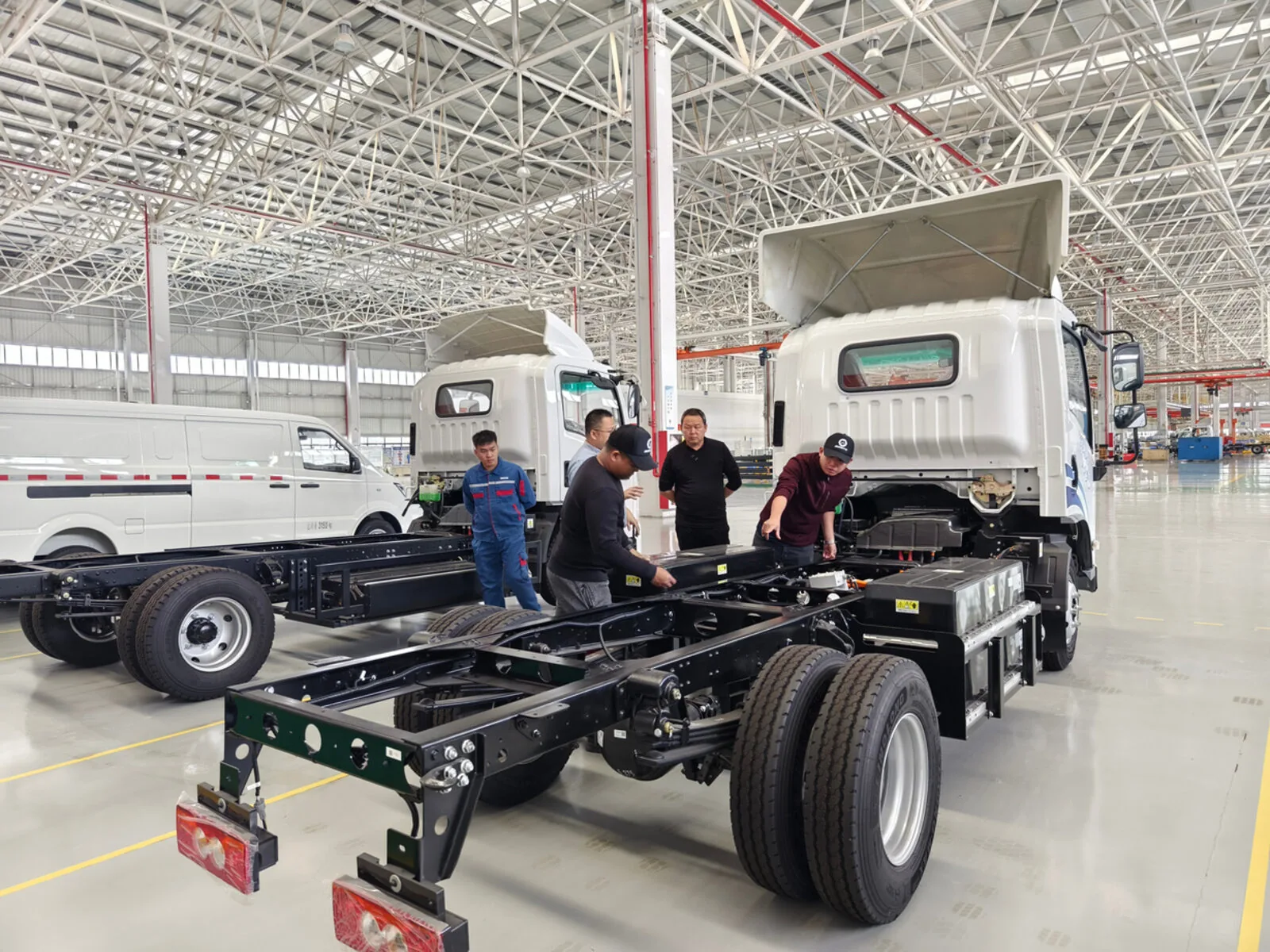 Chassis assembly facility inspection during the Philippine fleet buyer's technical due diligence visit to a Chinese new-energy vehicle manufacturer